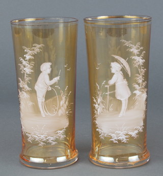 A pair of Mary Gregory style amber coloured beakers 5 1/2"  