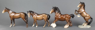 A Beswick brown shire horse 10 1/2", a ditto race horse 10", a ditto race horse (head left) 11" and a rearing horse 10 1/2" 