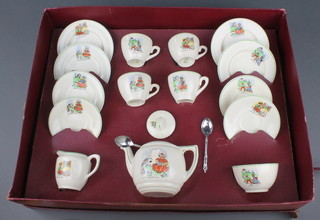A childs boxed tea set with nursery rhyme decoration 