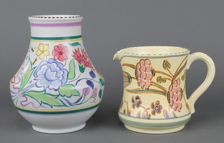 A Poole baluster vase decorated with a band of spring flowers 7" and a Honiton jug with stylised flowers 5" 