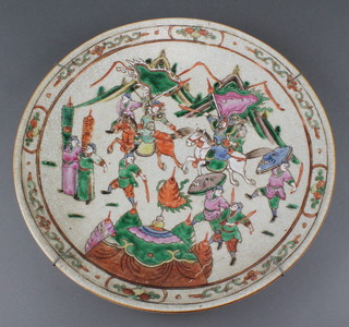 A Chinese crackle glazed charger decorated with warriors 15" 