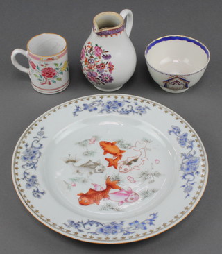 An 18th Century Chinese famille rose plate decorated with carp within flowers 9", a ditto famille rose tea cup decorated with flowers, a ditto armorial tea bowl and a baluster jug with insects amongst flowers 4" 