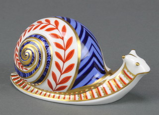 A Royal Crown Derby Imari pattern paperweight in the form of a snail with silver stopper 5 1/2" 