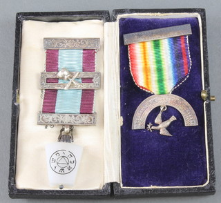 A silver mounted Mark Master Masons jewel and a ditto Royal Ark Mariners jewel 