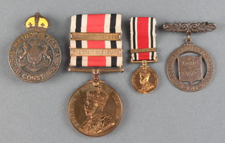 A George V issue Special Constabulary Long Service Good Conduct medal with 2 bars - Great War  1914-18 and Long Service 1929 to Sgt. Walter Ellis together with a ditto miniature medal and a bronze Special Constabulary Long Service medal 1914 and a ditto lapel badge 