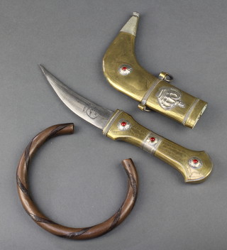 A Jambuka style dagger with 4 1/2" blade contained in a gilt scabbard together with a copper and steel necklet