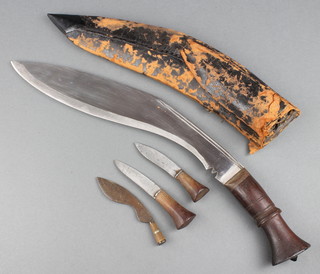 A Kukri with 12 1/2" blade and leather scabbard (damage to scabbard) together with 2 skinning knives 