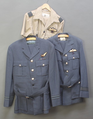 A Royal Air Force Flight Lieutenant's tunic, trousers with navigators half wing, medal ribbons, General Service medal and Queen's Commendation for Valuable Service in the air by Ye Ye, together with forage cap and an RAF Squadron Leaders tunic and trousers with pilots wings, campaign service medal ribbon and a tropical jacket and trousers 