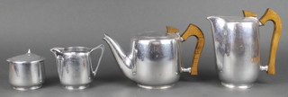 A Picquot Ware 4 piece tea service comprising teapot, hotwater jug, cream jug and sugar bowl 