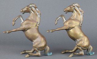 A pair of brass figures of rearing horses 8" 