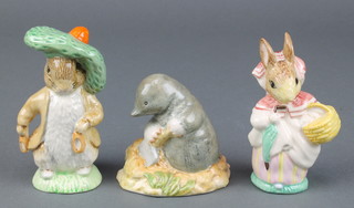 A Beswick Beatrix Potter figure - Mrs Rabbit 4", a Royal Albert ditto Diggery Diggery Delvit 3" and a Royal Doulton ditto Benjamin Bunny 4" 