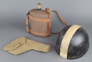 A dispatch riders combination safety hat by S Lewiss, a webbing holster dated 1941 and a military issue water bottle with a leather strap and fibre banding (some moth to the fibre) 