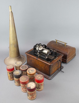 An Edison phonograph retailed by Palmer Bros. of Sunderland complete with horn and case (spring not working) together with 5 Edison gold moulded records, 1 Edison Records cylinder, 1 Edison Bell gold moulded record cylinder and The Clarion cylinder 