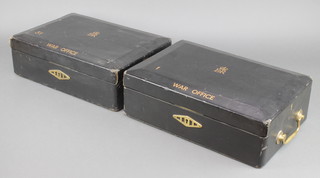 Two Elizabeth II black War Office issue dispatch boxes, the lids with Royal cypher marked War Office 1 and 31, having Chubb locks  5" x 16" x 11"
