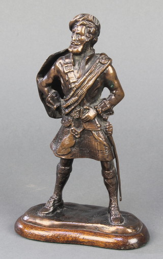 A bronze figure of a standing Scotsman 6 1/2" 