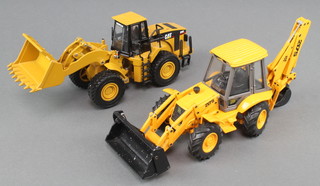 A Norscot Group scale model of an earth moving machine together with a Joal scale model of a JCB 
