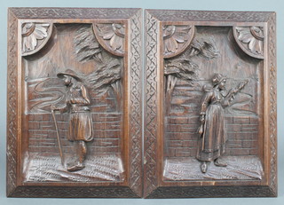 A pair of 19th Century Continental carved oak plaques of a lady and gentleman in period costume 14" x 10 1/2" 