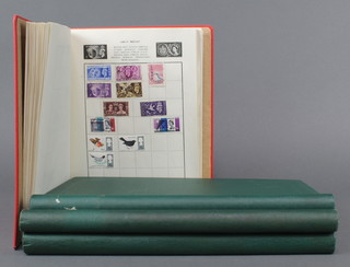 A Liberty orange album of mint and used world stamps and 3 green albums of Elizabeth II GB used stamps 