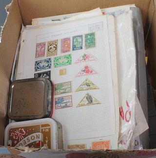 A collection of mint and used world stamps, some on envelopes etc 