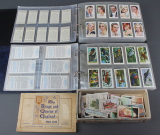 2 albums of cigarette and tea cards and various loose cigarette cards