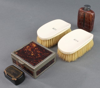 A pair of 1920's ivory military hair brushes monogrammed, a simulated tortoiseshell cigarette box with hinged lid 1" x 3 1/2" x 3", 19th Century black and gilt lacquered snuff box 1" x 2" x 1", a spirit hip flask with simulated crocodile mounts 3 1/2" together with a shooting stick 