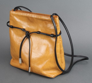 Kurt Geiger, a lady's mustard brown leather shoulder bag 10"h x 10"w x 4 1/2"d 
