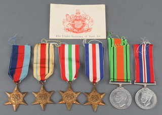 A group of 6 World War Two medals comprising 1939-45 Star, Africa Star, Italy Star, France and Germany Star, Defence and War medal complete with presentation certificate 