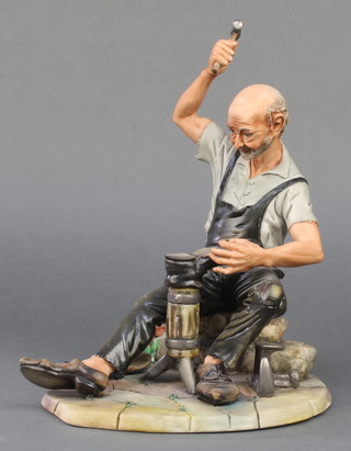 A Capodimonte figure of a cobbler, signed Volta 8"