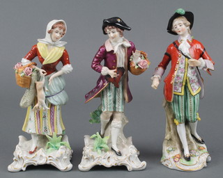 An Italian porcelain figure of a gentleman on a Rococo base 8", a pair of figures on Rococo bases 
