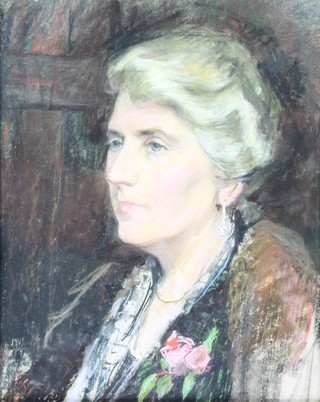 An early 20th Century mixed media, unsigned portrait of a lady in a carved frame 20" x 16" 