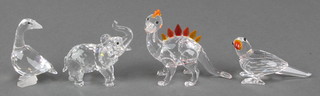 A Swarovski crystal 3 colour figure of a dinosaur, do. elephant 2", a parrot 2" and a goose 2" 
