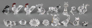 A collection of 16 miniature Swarovski crystal animals including penguin, bear, cockerell etc 