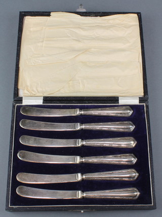 A cased set of silver handled butter knives