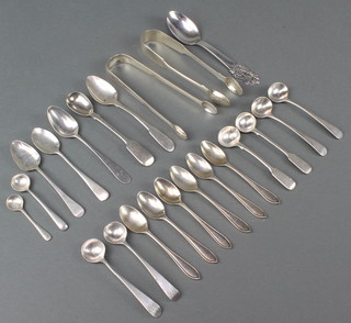A quantity of silver mixed spoons and nips 310 grams 