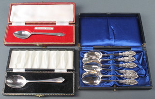 A cased silver presentation spoon Sheffield 1959, 1 other and 6 Thai spoons 