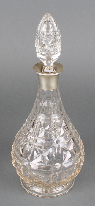 A cut glass mallet shaped decanter and stopper with silver collar Birmingham 1958 12" 