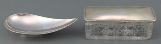 A stylish silver free form dish designed by Anthony Hawksley London 1989 56 grams 5" together with a silver mounted toilet box 