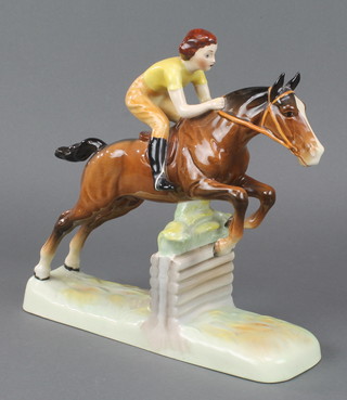 A Beswick group girl on a jumping horse model no.939 9 3/4" 