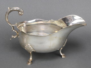 A silver sauce boat with S scroll handle and pad feet Sheffield 1926 174 grams
