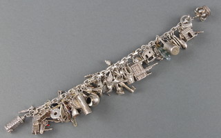 A silver charm bracelet 122 grams