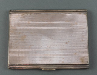 A silver engine turned cigarette case Birmingham 1939 159 grams