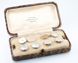 A set of 18ct and 9ct mother of pearl and seed pearl dress studs and cufflinks 