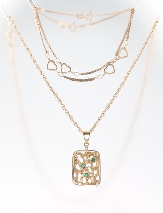 A 9ct yellow gold gem set pendant and 2 chains, gross 12 grams 