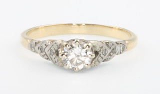 A yellow gold diamond set ring size K 1/2
