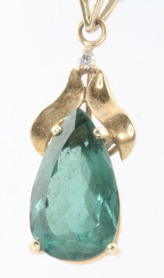 An 18ct yellow gold tourmaline set pendant and ear drops 