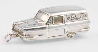 A silver pendant in the form of a Reliant Robin 27 grams 