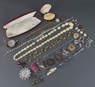 A quantity of Victorian and later costume jewellery, 2 silver crowns and a gold fob watch 