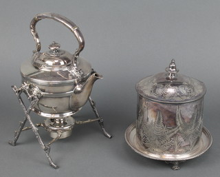 A Victorian silver plated chased biscuit barrel and ditto kettle on stand