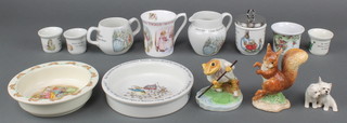 A Border Fine Arts Beatrix Potter figure - Mr Jeremy Fisher 4", a do. Squirrel Nutkin 4 1/2", a Beswick group of 2 West Highland terriers, Wedgwood Beatrix Potter jug, 2 handled bowl and 8 other Beatrix Potter items of tableware 