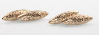 A pair of 9ct yellow gold torpedo shaped chased cufflinks 3.1 grams 